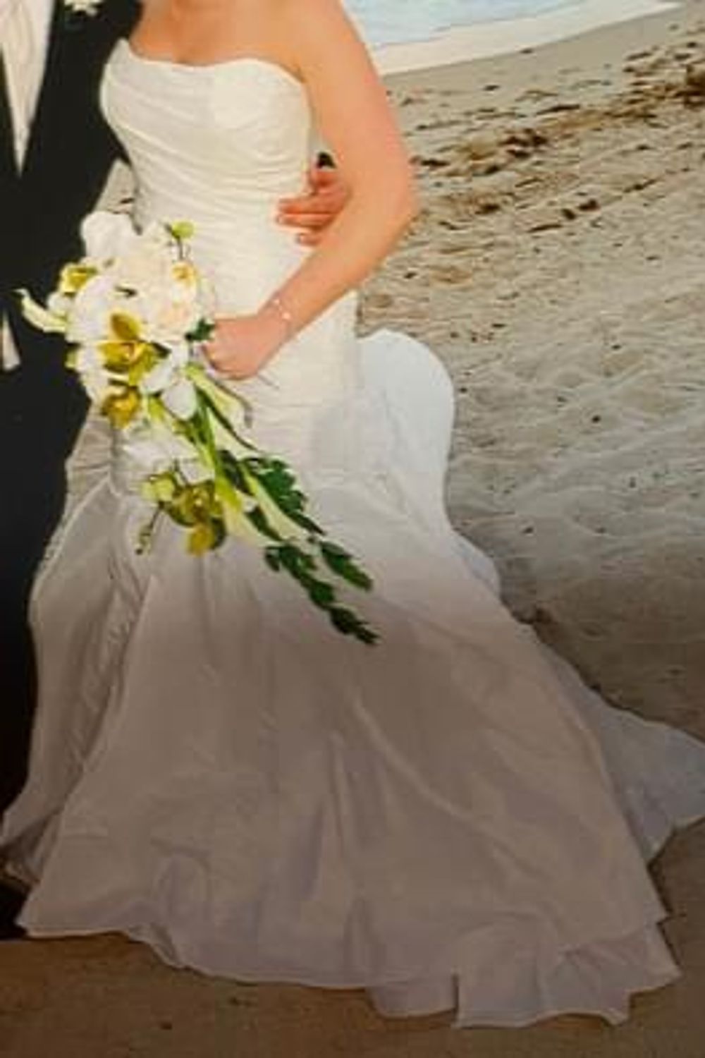 Marisa's Timeless Elegance: Designer Gowns Under $1,500