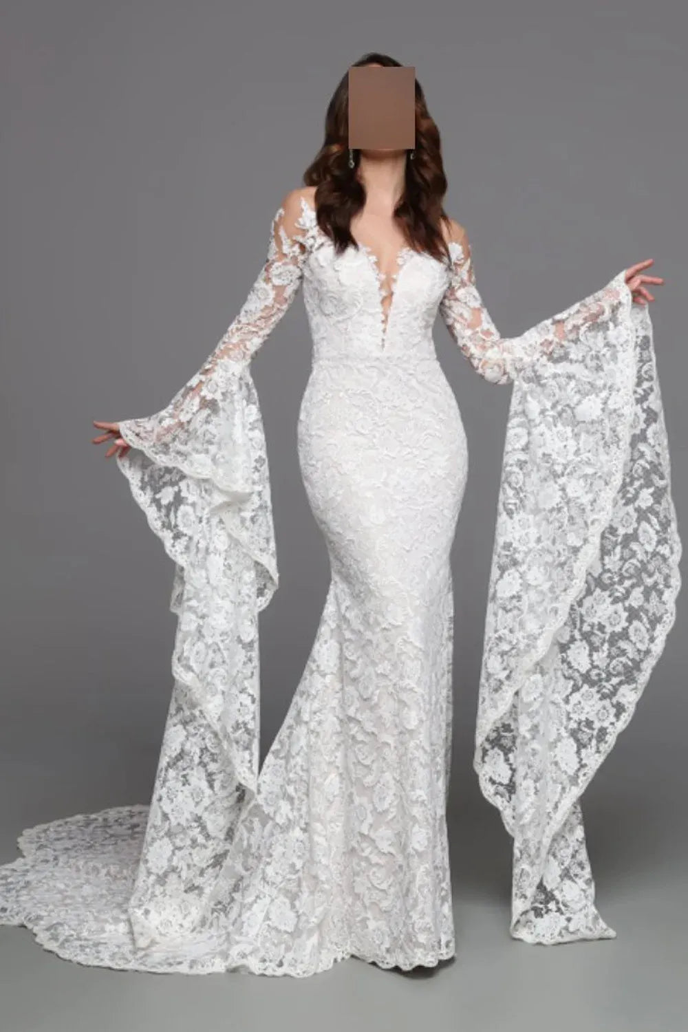 The Art of the Curve: DaVinci Fit and Flare Wedding Dresses
