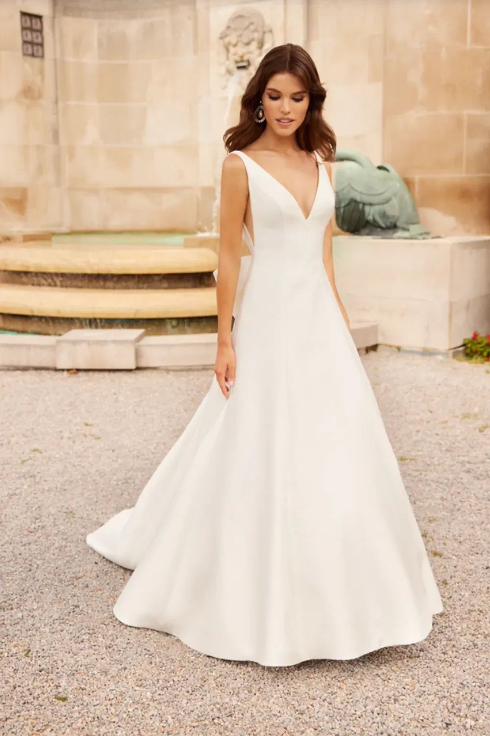 Paloma Blanca Elegance: Designer Gowns Under $1,200