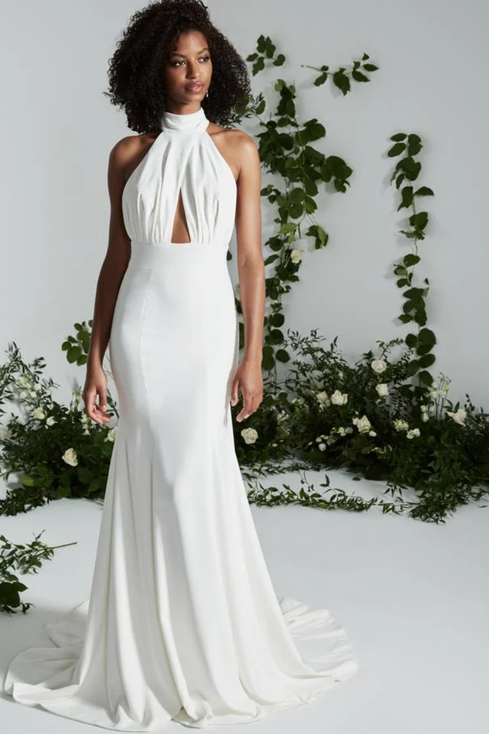 The Art of the Curve: Theia's Fit and Flare Wedding Gowns