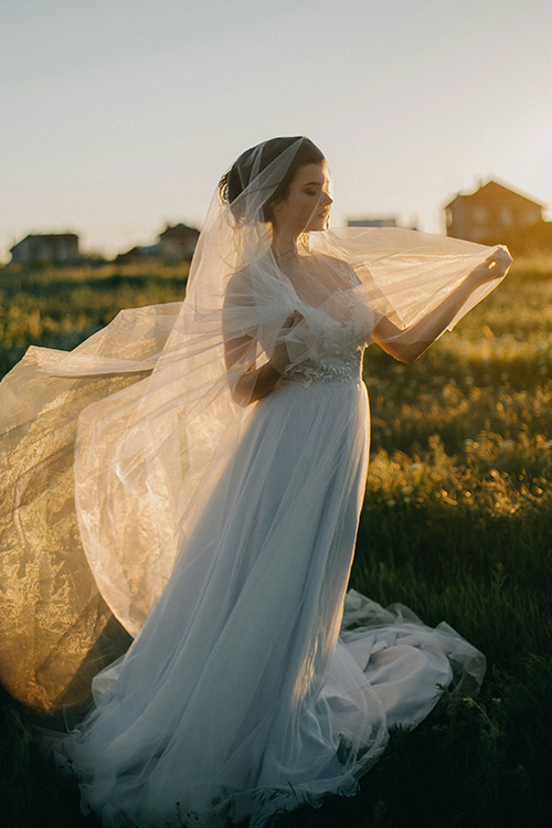 Wedding Dress Fabrics Explained: How Material Impacts Fit & Value
