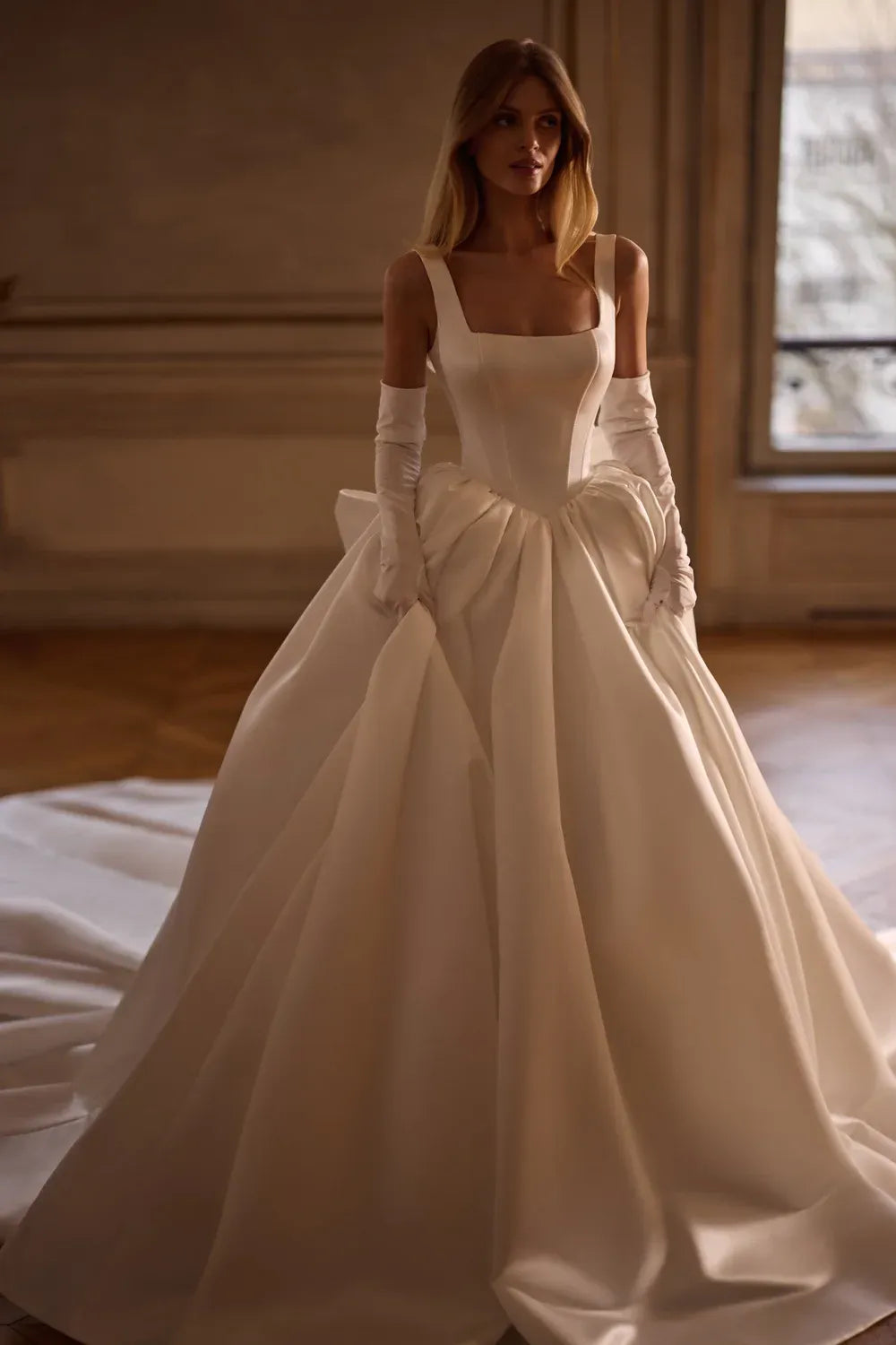 The Art of Allure: Mid-Back Wedding Dresses for the Modern Romantic