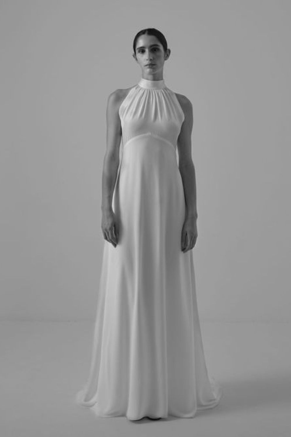 The Art of Simplicity: Marta Marti SL's Sheath Gowns Redefined