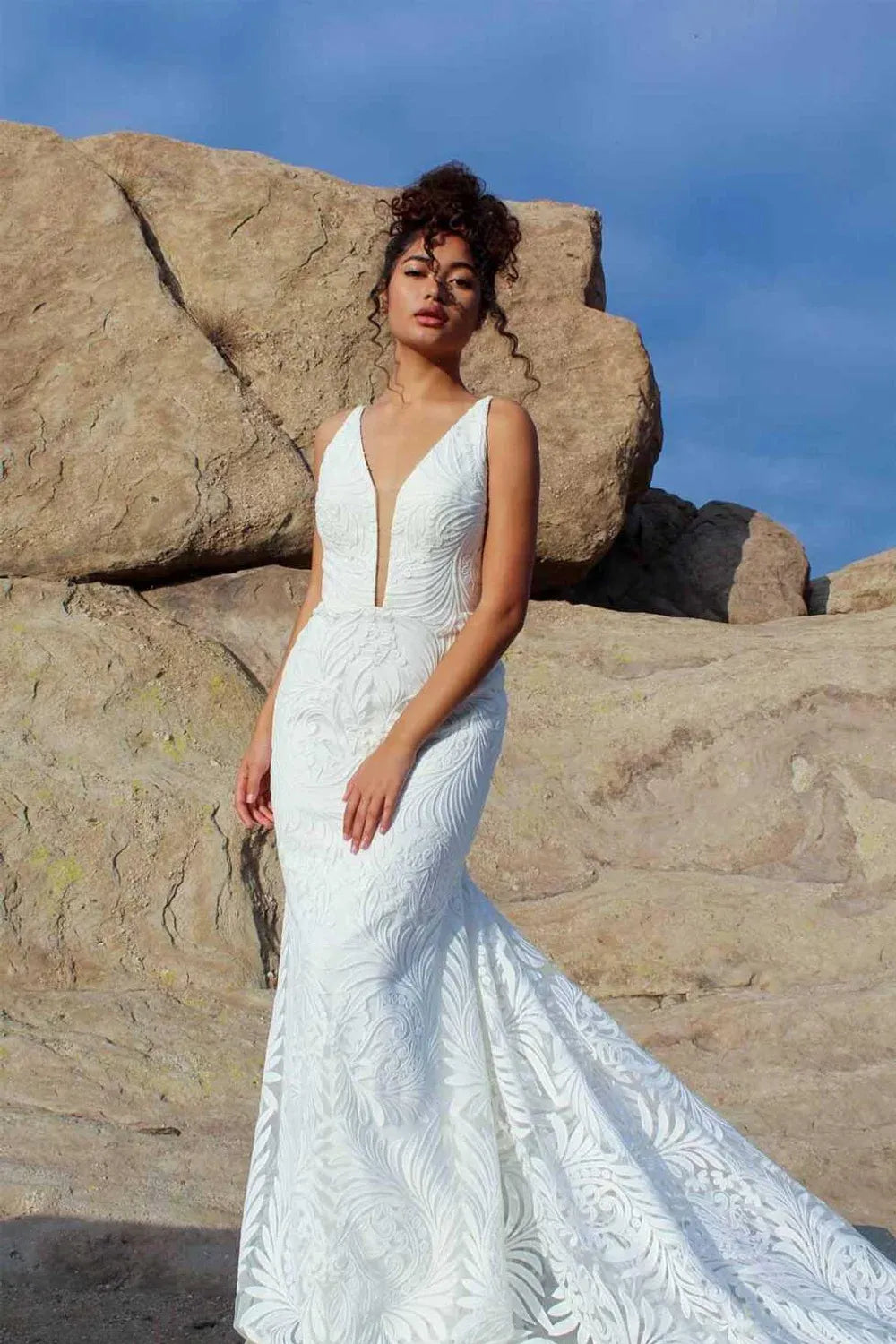 Free-Spirited Elegance: All Who Wander's Modern Sheath Revolution
